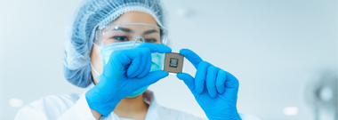 Electronics engineer examining CPU