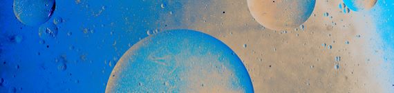 Water oil emulsion over colored background